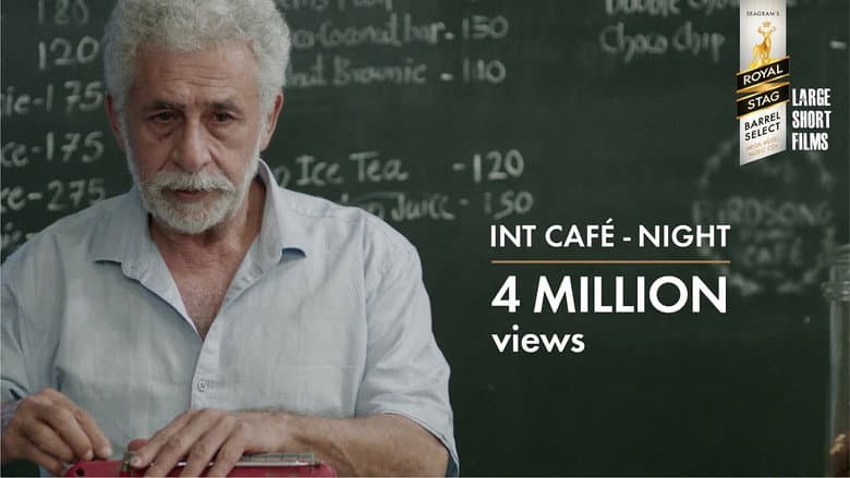 INT. CAFÉ – NIGHT still